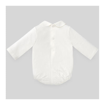 Knit newborn body in essential cream color, featuring long sleeves, a collar, and button closure at the back.