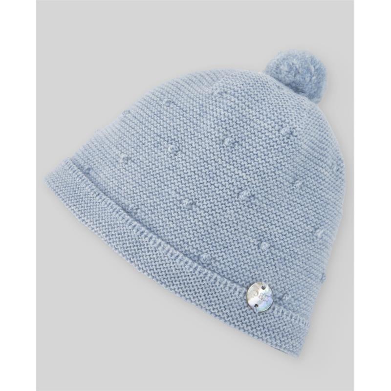 Knit newborn hat in chalk blue, featuring a textured design and a fluffy pom-pom on top, with a decorative button on the side.
