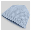 Knit newborn hat in sky blue with textured pattern and a small Paz logo tag.