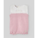 Knit newborn romper in chalk pink, featuring a white lace-trimmed collar and button detail at the bottom.