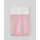 Knit newborn romper in chalk pink with a white lace-trimmed collar and three-button closure at the back.