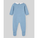 Knit newborn romper in Dutch blue with long sleeves and a white Peter Pan collar.