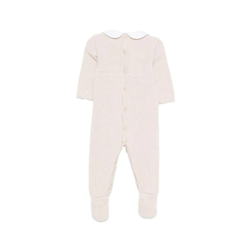 Knit newborn romper in linen and white with long sleeves, a white collar, and button closure on the back.