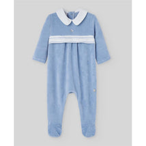 Knit newborn romper in Dutch blue, featuring a white collar and decorative button, designed for comfort and style.