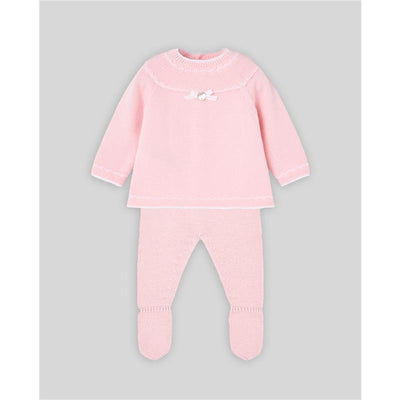 Knit newborn sweater and leggings set in powder pink and cream, featuring a decorative bow on the sweater.