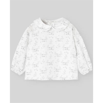 Woven newborn blouse in grey with delicate floral patterns and a rounded collar, designed for comfort and style.