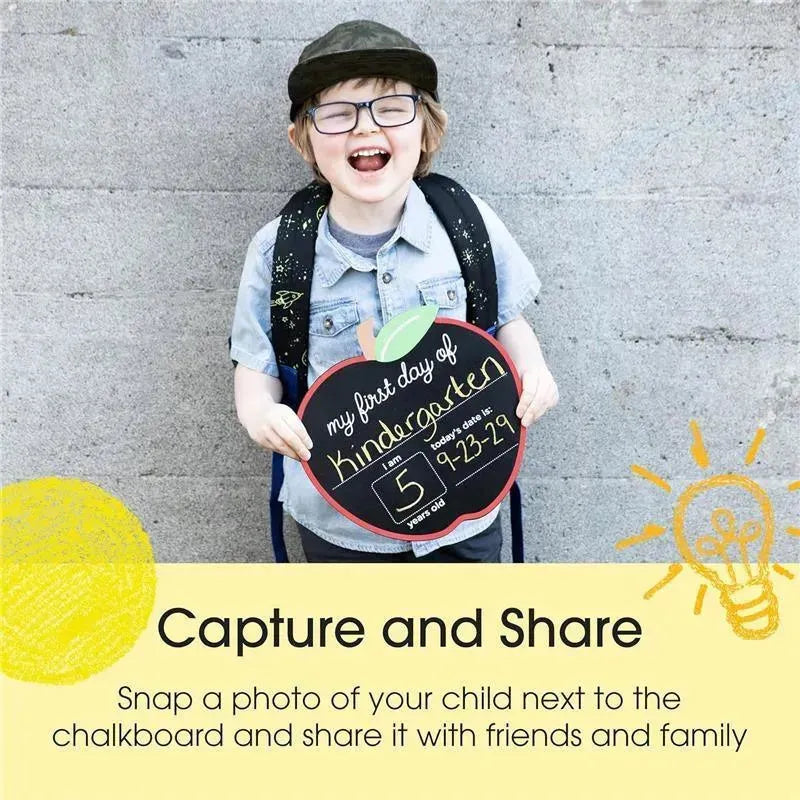 Child holding a chalkboard sign for their first day of kindergarten, stating their age and date, smiling joyfully.
