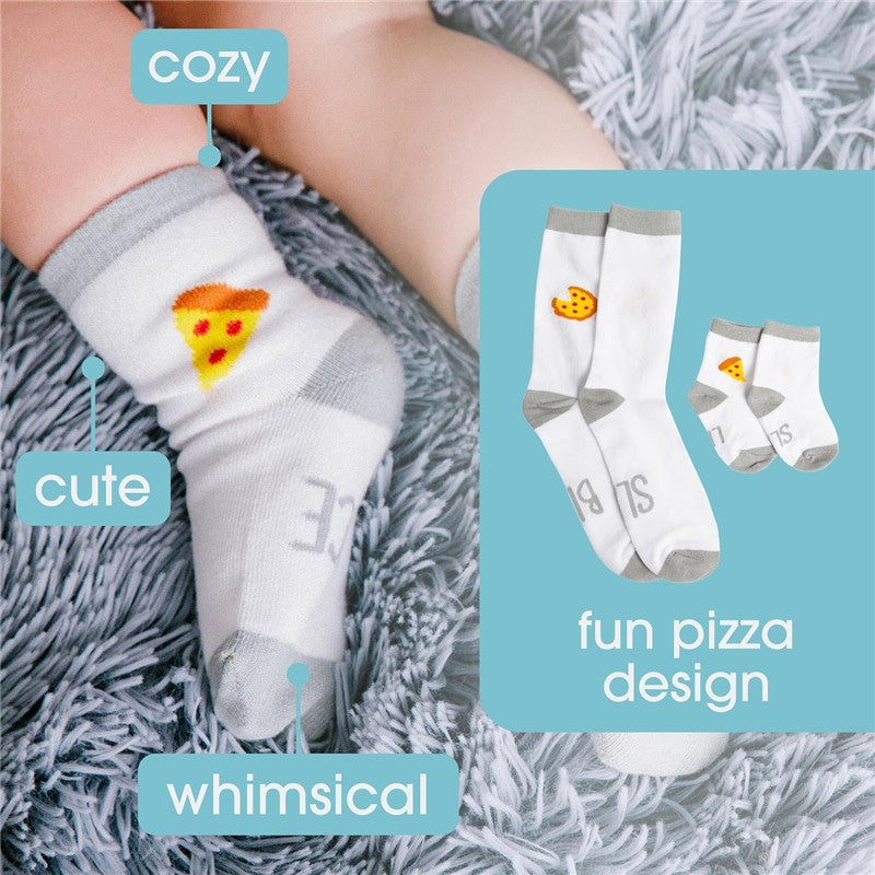 Matching Daddy & Me pizza socks featuring a fun pizza design on white fabric, laid on a cozy, textured surface.