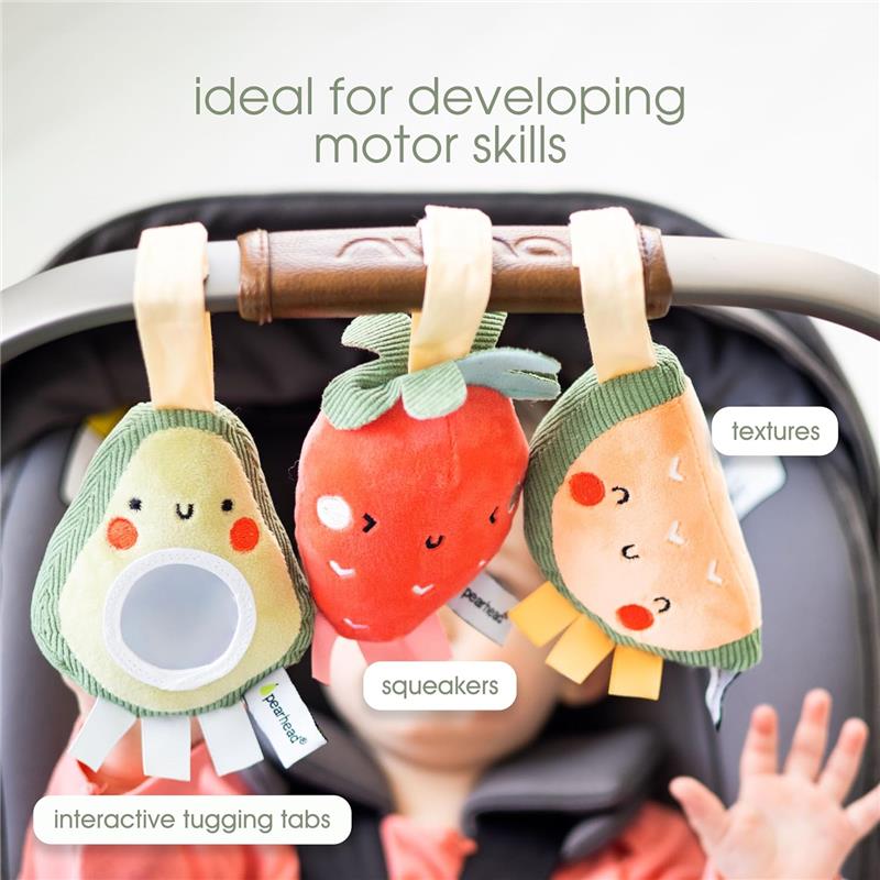 Stroller toy set featuring three fruit plush toys: avocado, strawberry, and taco, designed to develop motor skills with textures and squeakers.