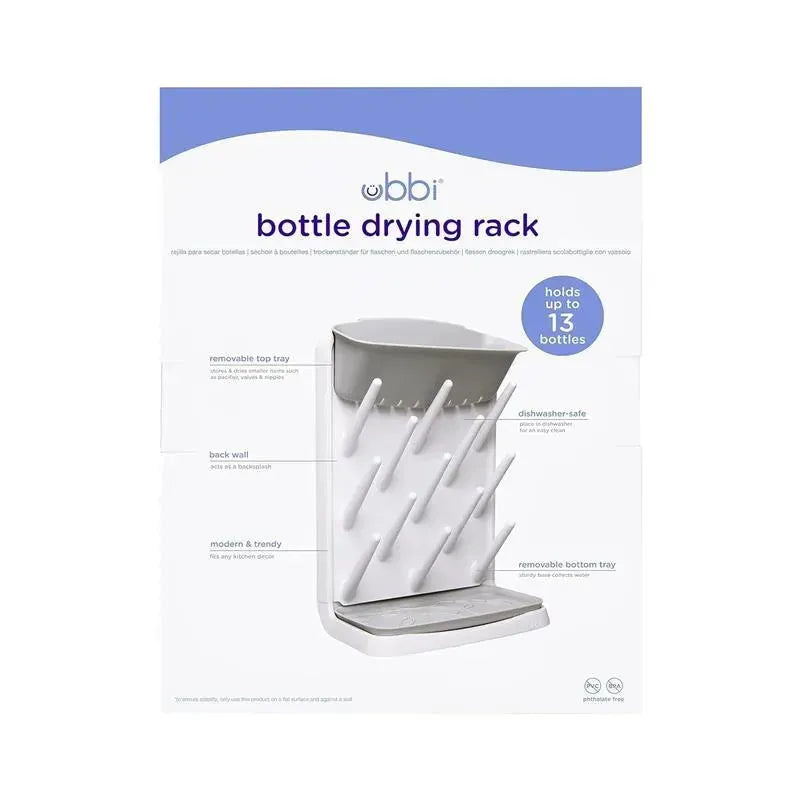 Ubbi Vertical Baby Bottle Drying Rack in gray, designed to hold up to 13 bottles, features a removable top tray and bottom tray.