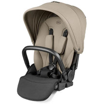Full-size Peg-Perego City Loop reversible stroller in Vanilla Blend with a large canopy, safety harness, and padded seat.