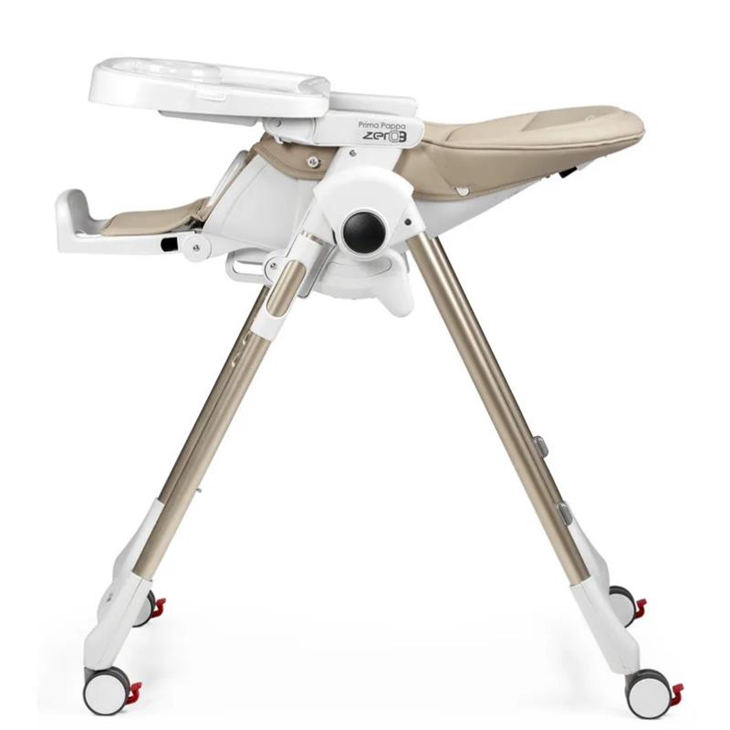 Peg Prima Pappa Zero 3 high chair in beige, featuring a removable tray and adjustable seat on wheels for easy mobility.