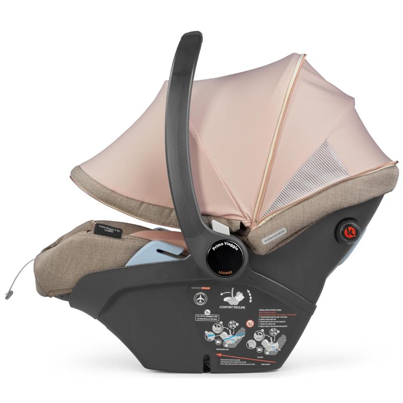 Peg Primo Viaggio Lounge Infant Car Seat in Mon Amour color; features a cozy design, adjustable canopy, and user instructions visible.