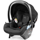 Infant car seat, Peg Primo Viaggio Lounge in True Black, featuring a padded interior, adjustable canopy, and safety labels.