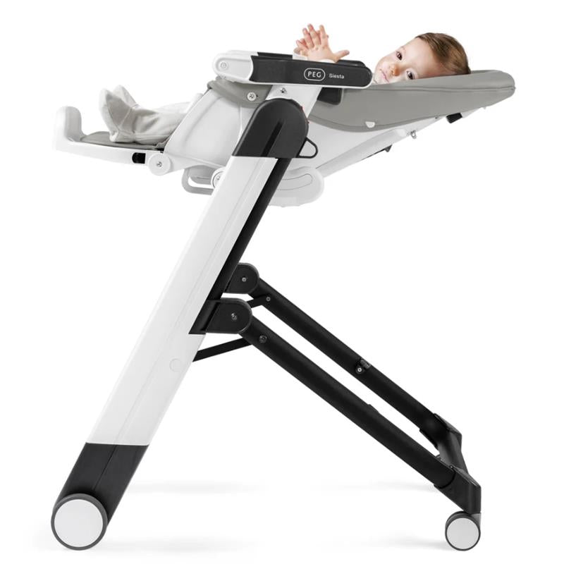 Peg Siesta High Chair in beige with slim, adjustable design; a baby lies back comfortably, waving hands.