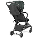 Compact Peg Volo stroller in sage green with a black seat and canopy, viewed from the back.