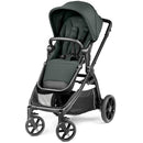 Peg Perego Ypsi Single to Double Stroller in Sage Green, featuring a padded seat, canopy, and storage basket.