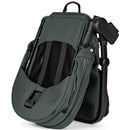 Single-to-double stroller in sage green, featuring a foldable design, mesh panel, and adjustable handle.