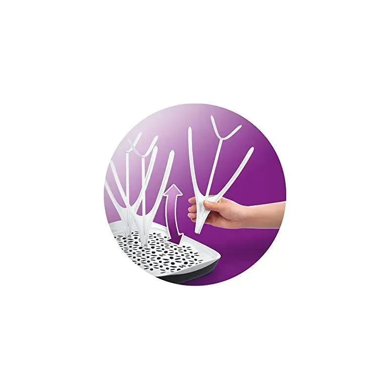 Avent Baby Bottle Drying Rack with adjustable white drying branches on a ventilated base, shown with a hand repositioning one branch.