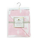 Feather chenille stroller blanket by Piccolo Bambino, pink with white accents, hanging on a wooden hanger.