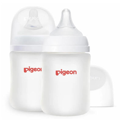 Two Pigeon wide-neck baby bottles with silicone-coated glass, each holding 5 oz, featuring a clear design and red logo.
