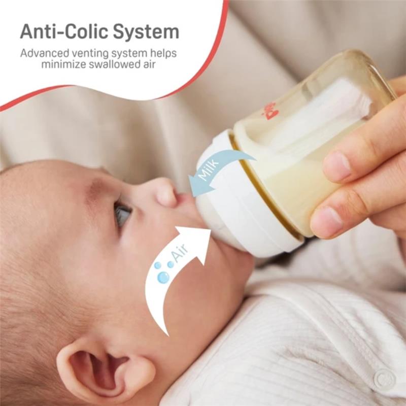 Silicone nipple for infants aged 9+ months, demonstrating an anti-colic venting system with arrows indicating milk and air flow.