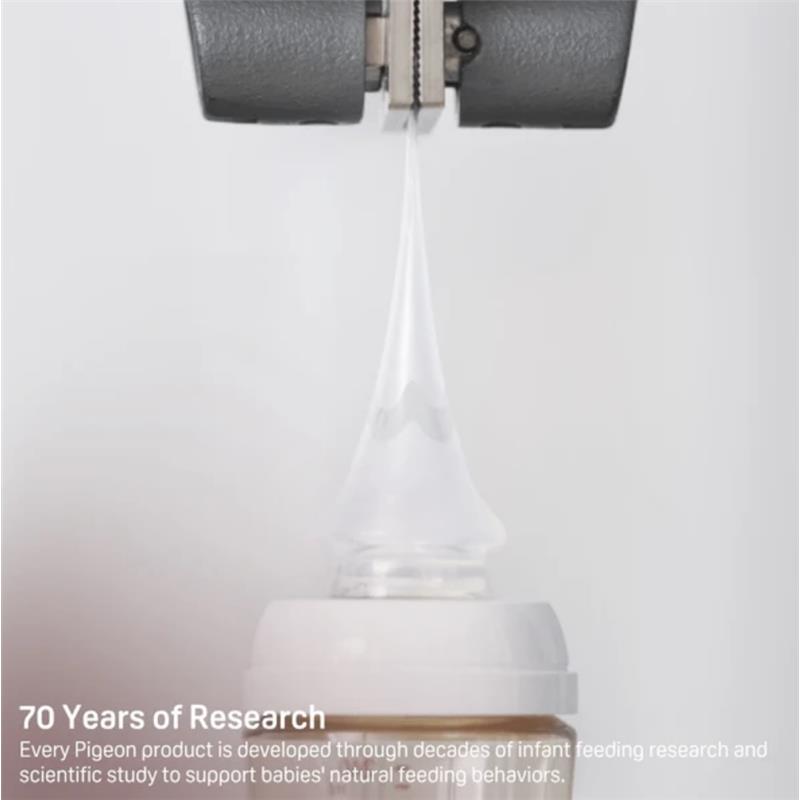 Silicone nipple from Pigeon designed for infants 0+ months, shown with a drip of liquid highlighting its use.