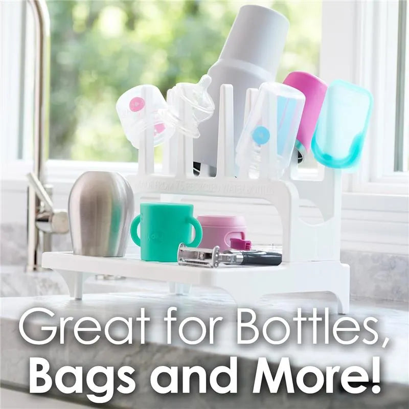 Gray drying rack displaying various colorful bottles and lids, with text highlighting its use for bottles, bags, and more.