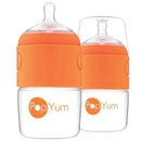 Two 5 oz PopYum baby bottles in clear plastic with orange silicone grips, designed to reduce colic.