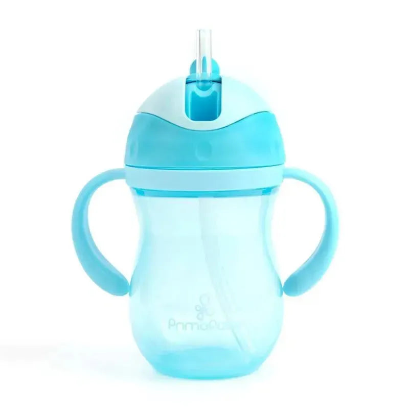 9 oz blue straw cup by Primo Passi, featuring a transparent body, blue lid and handles, designed for toddlers.