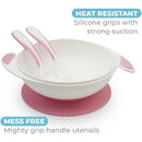 Primo Passi baby suction bowl set in light pink, featuring a heat-resistant bowl with silicone grips and included fork and spoon.