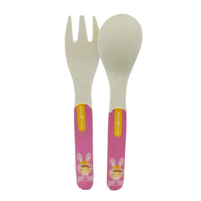 Bamboo fiber kids spoon and fork set by Primo Passi, featuring pink handles with bunny designs.