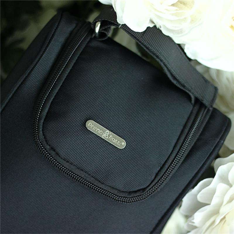 Insulated bottle bag by Primo Passi in pink with a zipper and carrying handle, surrounded by white flowers.