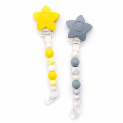 Silicone baby pacifier holder clips in yellow and gray star shapes, featuring colorful beads for attachment.