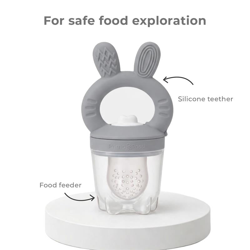 Silicone food feeder with a bunny ear handle, designed for safe food exploration for infants.