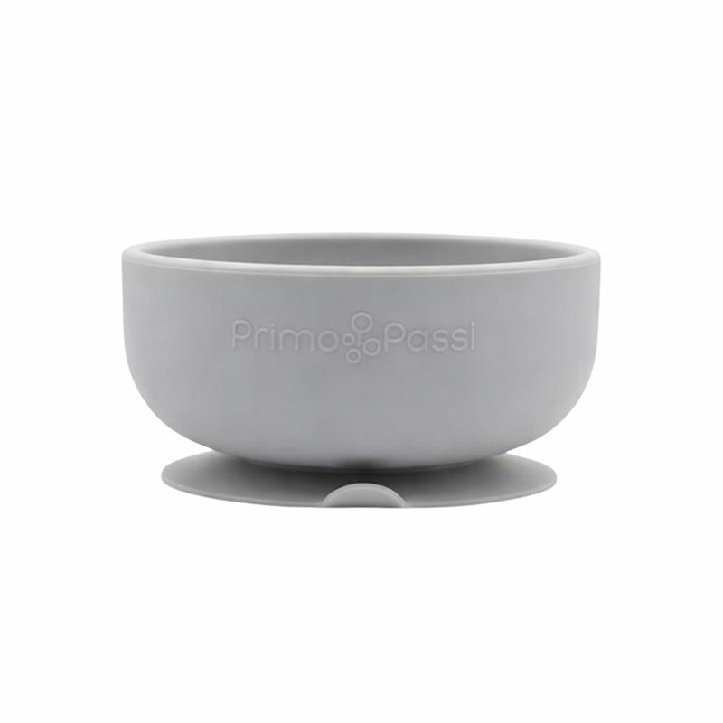 Grey silicone suction bowl from Primo Passi, designed for young children, featuring a stable base to prevent spills.