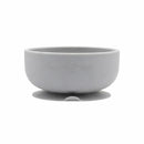 Grey silicone suction bowl from Primo Passi, designed for young children, featuring a stable base to prevent spills.