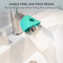 Faucet extender in glacier color securely attached to a faucet, directing water flow into a sink with visible splashes.