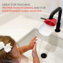 Faucet extender in gumball green attached to a black faucet, helping a child wash hands under running water.