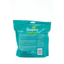 Pampers Cruisers changing kit package featuring instructions and product details in English and Spanish.