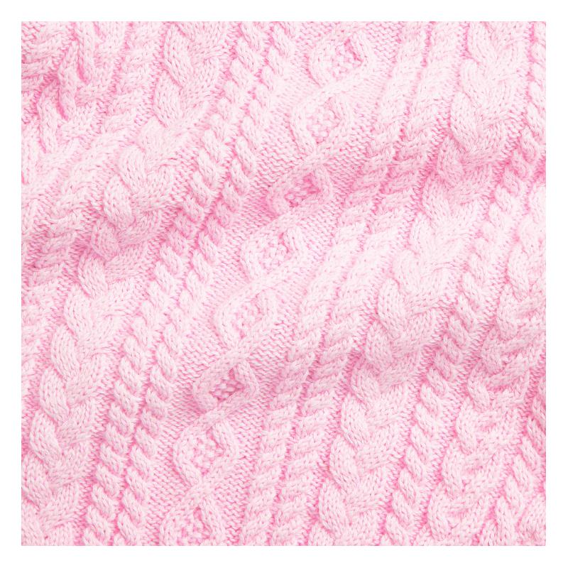 Pink knitted fabric with a cable pattern, representing the Ralph Lauren Baby sleeveless cotton sweater shortall.