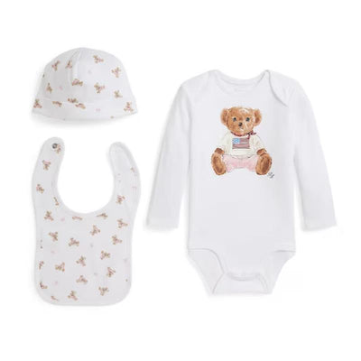 Long-sleeve interlock bodysuit with bear graphic, matching hat, and bib adorned with bear prints.