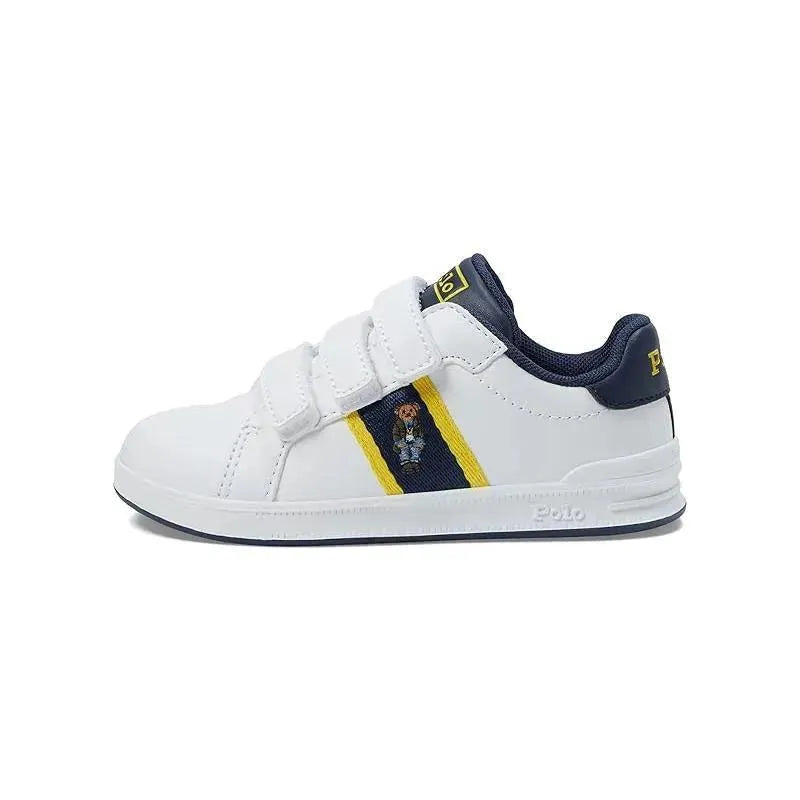 White sneaker with velcro straps, featuring a yellow stripe and embroidered bear logo, designed for babies by Ralph Lauren.