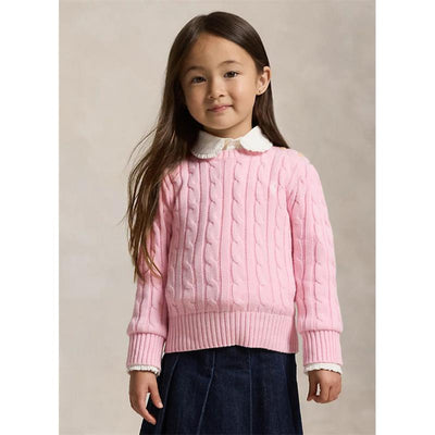 Ralph Lauren baby long sleeve cotton cable sweater in hint of pink, worn by a girl with long hair and white collared shirt.