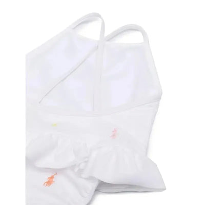 Ruffled white polo dress and bloomer set for babies with colorful embroidered logos.