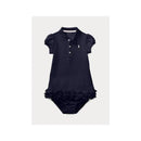 Ralph Lauren baby ruffled polo dress in French navy with short sleeves, a ruffled hem, and a small logo on the chest.