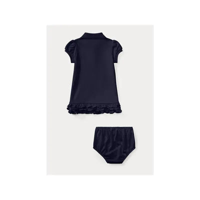Baby ruffled polo dress and bloomer set in French navy, featuring short puff sleeves and a ruffled hem.