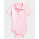 Ralph Lauren baby short-sleeve polo bodysuit in Carmel Pink with two buttons and logo on the chest.