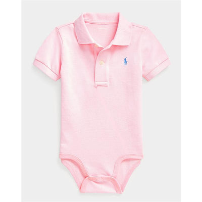 Ralph Lauren baby short-sleeve polo bodysuit in Carmel Pink with two buttons and logo on the chest.