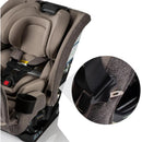 Romer Nexa All-in-One Convertible Car Seat in Truffle color with harness system and cup holder, showcasing safety features.